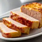 Leberkäse m9ata3 b’coupe kbir, bnina wrosa, 3la board fblad bzar